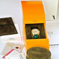 Omega Speedmaster date gold